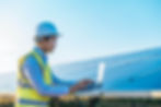 Solar Technician Inspecting a solar plant project