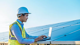 young-asian-inspector-engineer-man-use-laptop-computer-working-solar-farm-technician-super